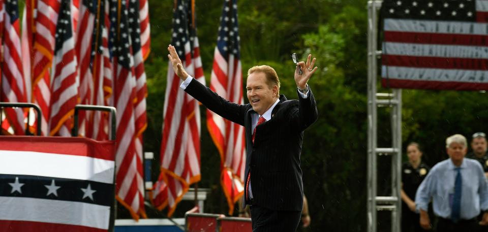 U.S. Rep. Vern Buchanan waves to spectators during a July 2021 rally for former President Donald Trump at the Sarasota Fairgrounds.