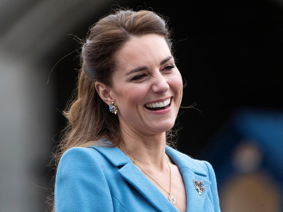 Britain's Catherine, Duchess of Cambridge reacts during a Beating of the Retreat at Holyroodhouse Palace in Edinburgh, Scotland (REUTERS)