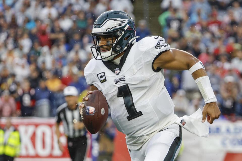 Philadelphia Eagles quarterback Jalen Hurts runs against the New England Patriots.