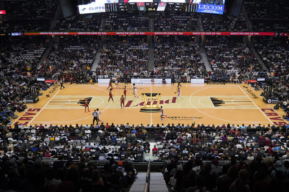 The Detroit Pistons take the ball up the court during the first half of an In-Season Tournament NBA basketball game against the Cleveland Cavaliers, Friday, Nov. 17, 2023, in Cleveland. (AP Photo/Sue Ogrocki)