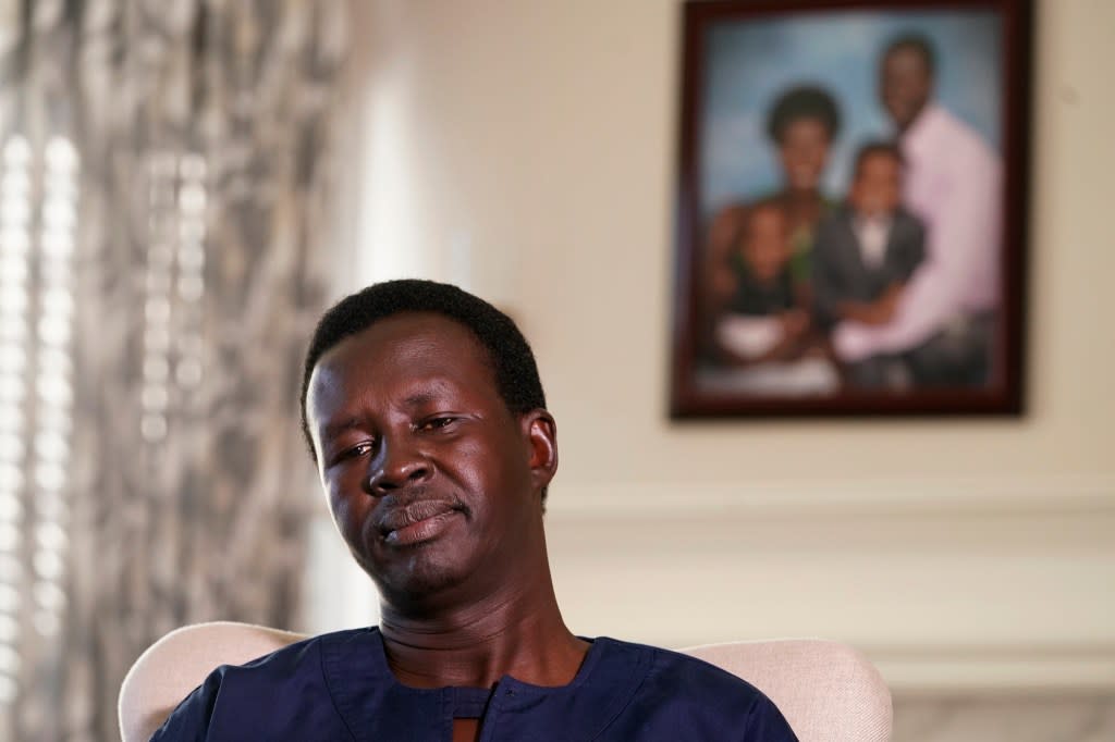 Jacob Mabil pauses during an interview at his home about his two nieces on Wednesday, Nov. 8, 2023, in Haslet, Texas. Mabil is one of Sudan’s “Lost Boys,” and is trying to get his two nieces from African refugee camps to the U.S. to live with him and his family. (AP Photo/LM Otero)