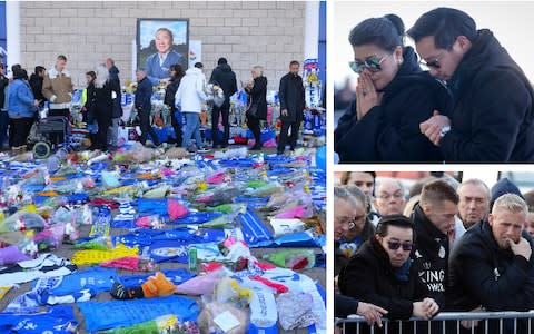 Vichai Srivaddhanaprabha's wife and son pay their respects, top right, before Jamie Vardy, Kasper Schmeichel and the Leicester City squad joined them - Credit: Getty Images