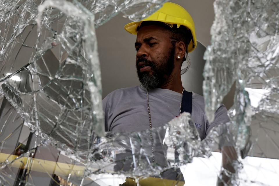 The clean-up at Planalto Palace (Reuters)