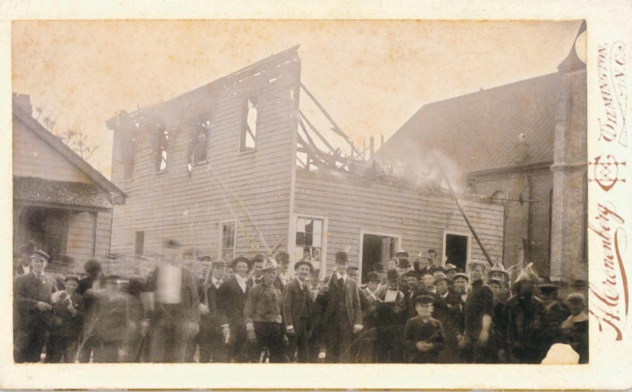 <span class="caption">Armed white insurrectionists murdered Black men and burned Black businesses, including this newspaper office, during the Wilmington coup of 1898.</span> <span class="attribution"><a class="link " href="http://www.history.ncdcr.gov/1898-wrrc/hearings.htm" rel="nofollow noopener" target="_blank" data-ylk="slk:Daily Record, North Carolina Archives and History;elm:context_link;itc:0;sec:content-canvas">Daily Record, North Carolina Archives and History</a></span>