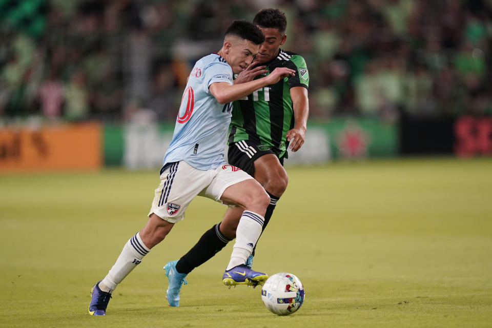 FC Dallas forward Alan Velasco, left, moves the ball past Austin FC midfielder Owen Wolff, right, during the second half of an MLS soccer match, Saturday, June 25, 2022, in Austin, Texas. (AP Photo/Eric Gay)