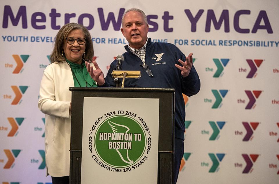 Patricia Duarte, left, board chair for the MetroWest YMCA, and Rick MacPherson, president and CEO for the organization, speak during the MetroWest YMCA Marathon Community Breakfast and Annual Campaign Kick-Off event at the Sheraton Framingham Hotel & Conference Center, March 14, 2024.