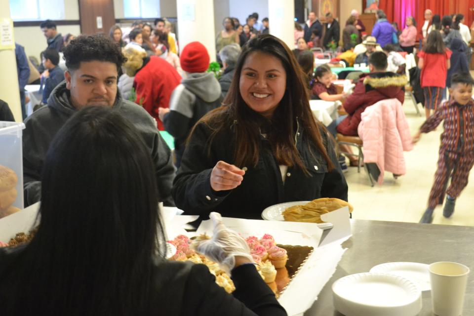 Volunteers served Hispanic food including tamales and ponche to attendees of the Feast Day of Our Lady of Guadalupe at St. Joseph's Church in Newport on Sunday Dec. 18, 2022.