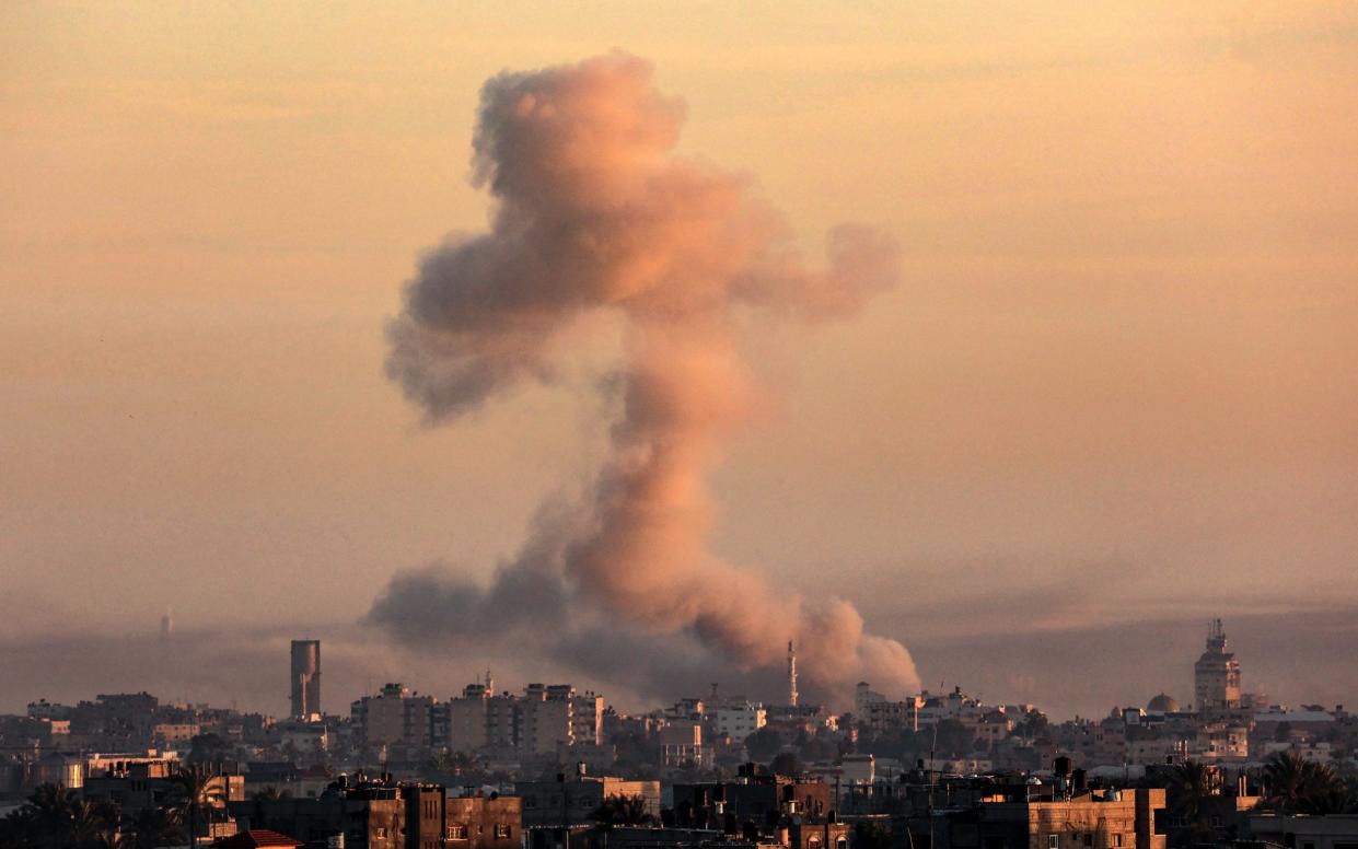 Rafah shows smoke billowing over Khan Yunis in the southern Gaza Strip