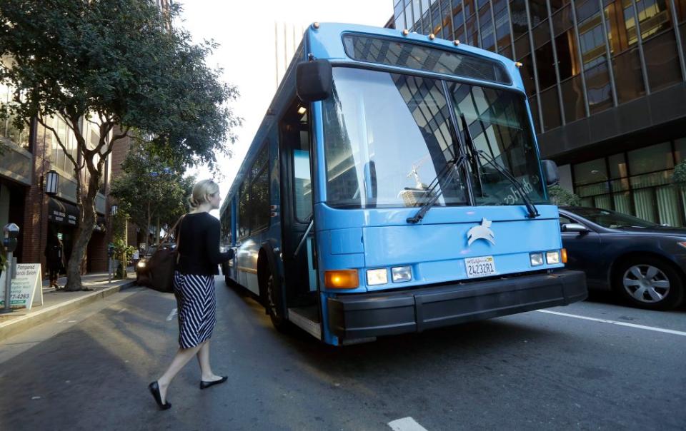 A person getting bus to work