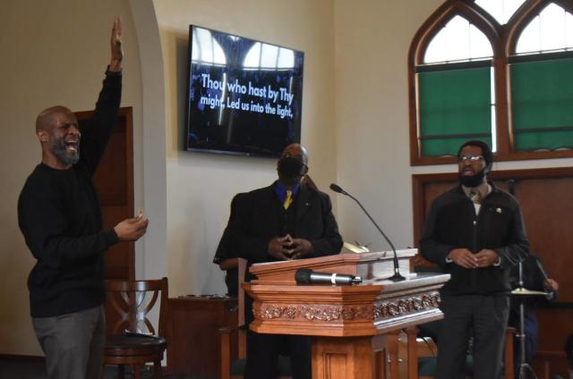 Willie Williams leads the audience in singing the Negro National Anthem at the annual commemoration of the Rev. Martin Luther King Jr. at Christian Love Baptist Church in Modesto on Monday, Jan. 17, 2022.