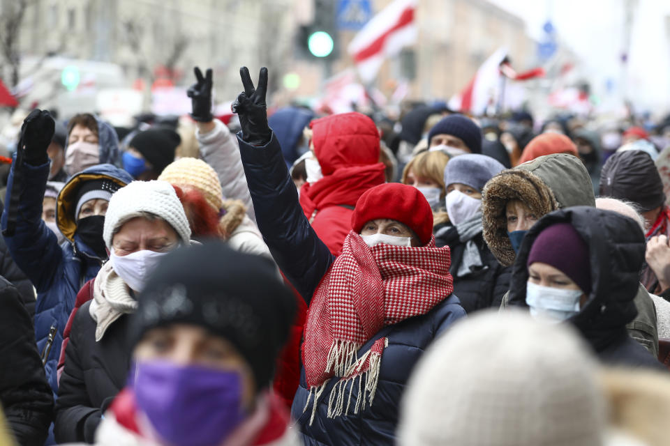 Belarusian pensioners wearing face masks to protect against coronavirus attend an opposition rally to protest the official presidential election results in Minsk, Belarus, Monday, Nov. 16, 2020. Crowds of retirees marched down the streets of the Belarusian capital on Monday, demanding the resignation of the country's authoritarian president and to end the government crackdown on peaceful protesters. (AP Photo)