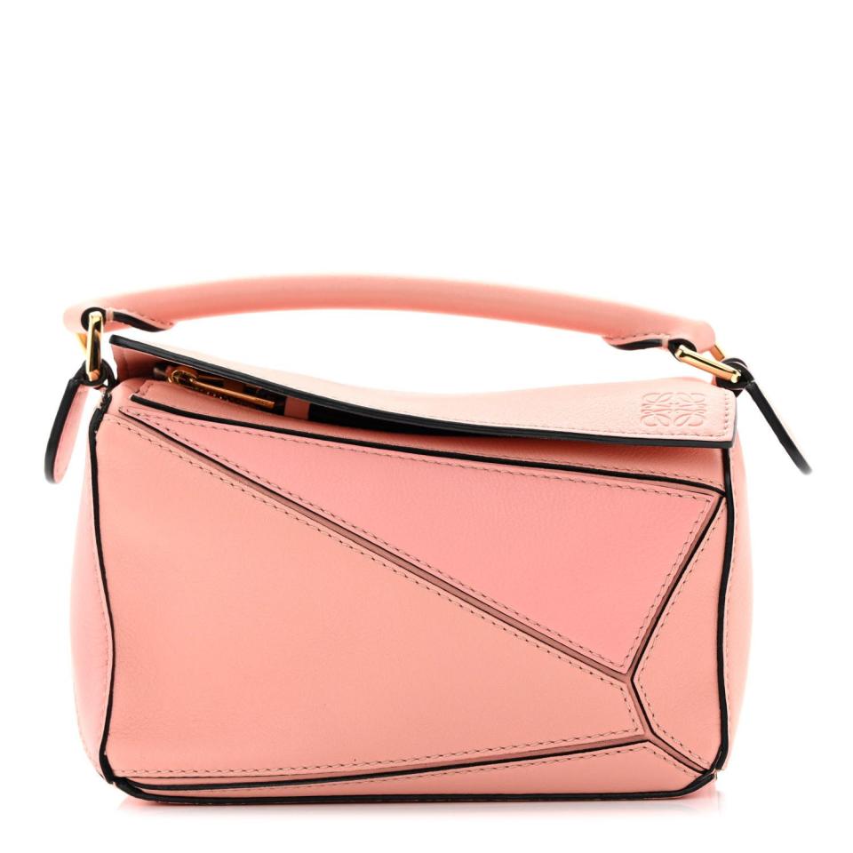 <p><a href="https://go.redirectingat.com?id=74968X1596630&url=https%3A%2F%2Fwww.fashionphile.com%2Fp%2Floewe-calfskin-mini-puzzle-bag-blossom-1293723&sref=https%3A%2F%2F" rel="nofollow noopener" target="_blank" data-ylk="slk:Shop Now;elm:context_link;itc:0;sec:content-canvas" class="link ">Shop Now</a></p><p>LOEWE Calfskin Mini Puzzle Bag Blossom</p><p>fashionphile.com</p><p>$1525.00</p>