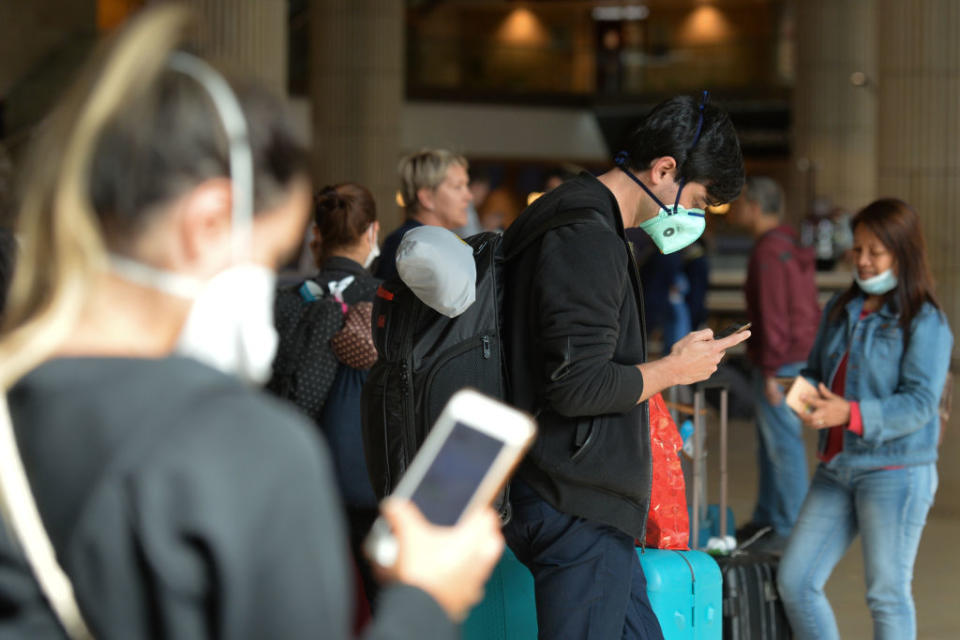 Passengers wearing protective masks seen in the arrivals hall of Terminal 3 at the Ben Gurion Airport, Tel Aviv-Yafo, Israel, on Tuesday, March 10, 2020. (Photo by Artur Widak/NurPhoto)