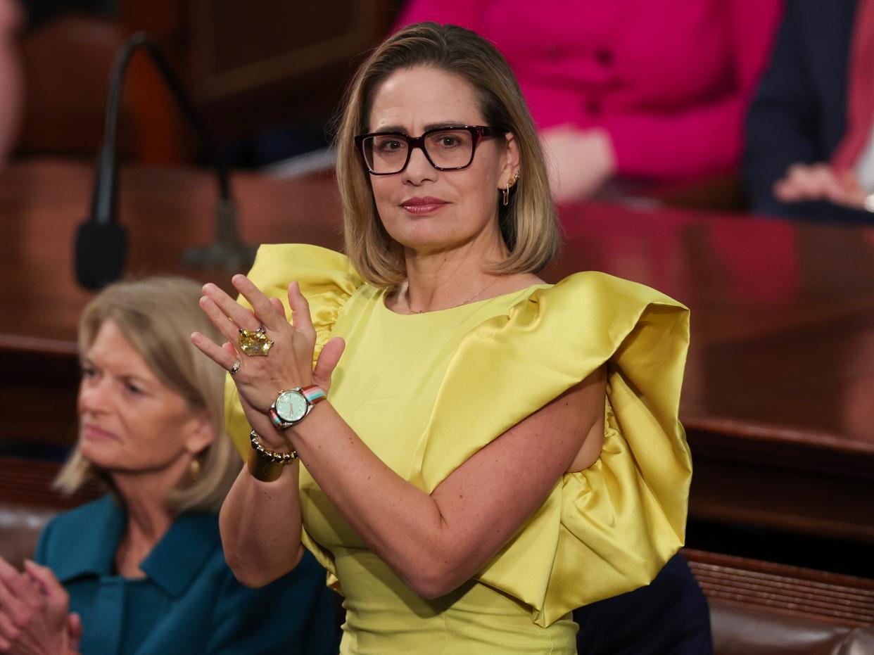 U.S. Sen. Kyrsten Sinema (I-AZ) applauds during U.S. President Joe Biden's State of the Union address during a joint meeting of Congress in the House Chamber of the U.S. Capitol on February 07, 2023 in Washington, DC.