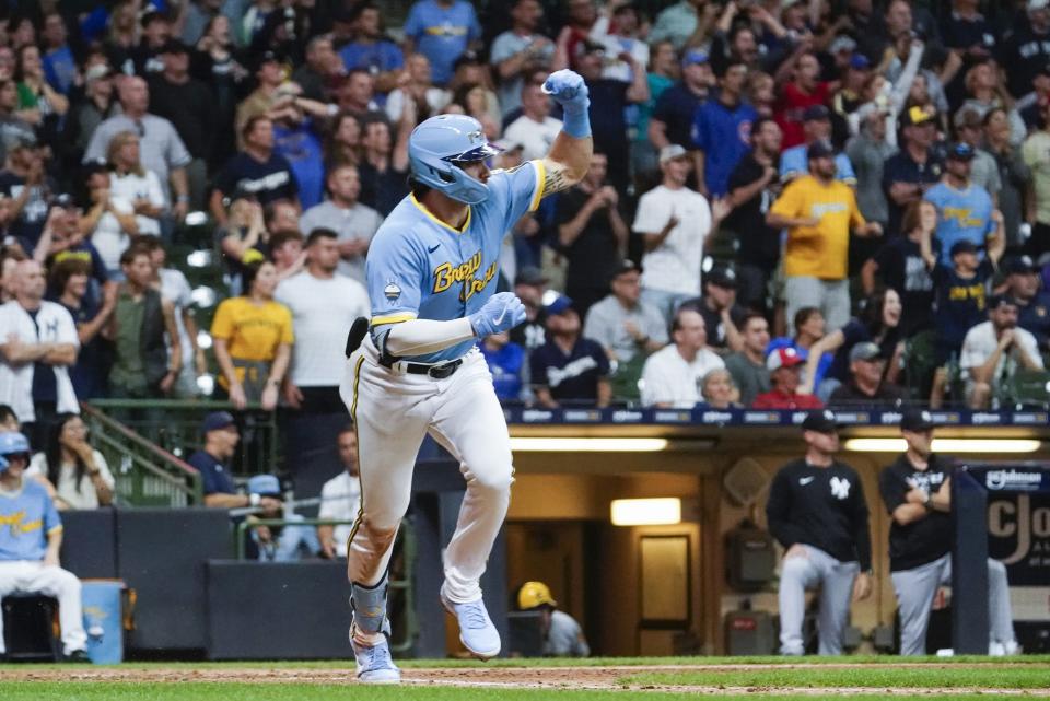 Milwaukee Brewers' Garrett Mitchell hits a game winning walk off single during the ninth inning of a baseball game against the New York Yankees Friday, Sept. 16, 2022, in Milwaukee. The Brewers won 7-6. (AP Photo/Morry Gash)