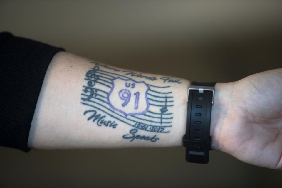 Megan O'Donnell Clements displays her tattoo in remembrance of the 2017 mass shooting at the Route 91 Harvest music festival in Las Vegas. 