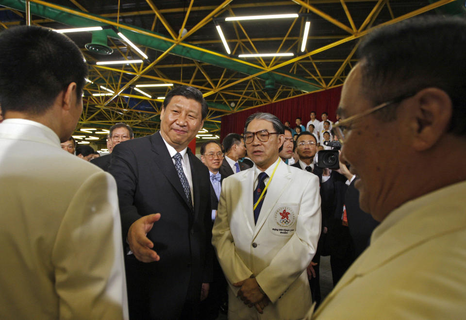 時任國家副主席習近平7月已來港，賽前參觀場地。 ( BOBBY YIP/AFP via Getty Images)