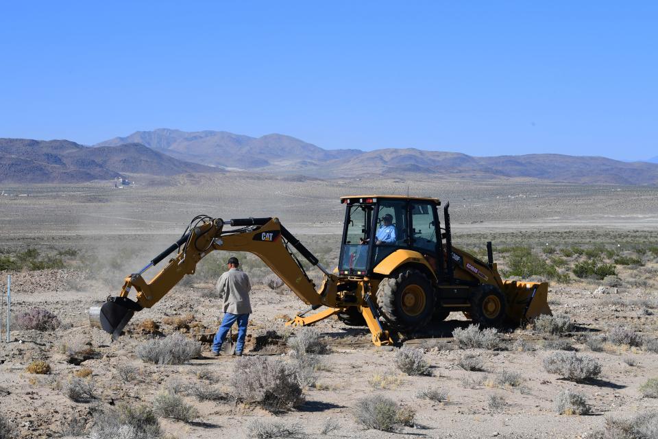 Construction workers fix a broken water line next to Highway 178, south of Trona, after a 6.4-magnitude earthquake hit in Ridgecrest, California, on July 4, 2019. - Southern California was rocked by a 6.4-magnitude earthquake Thursday morning, the US Geological Survey said, with authorities warning that the temblor, the largest in two decades, might not be the day's last. (Photo by FREDERIC J. BROWN / AFP)        (Photo credit should read FREDERIC J. BROWN/AFP/Getty Images)