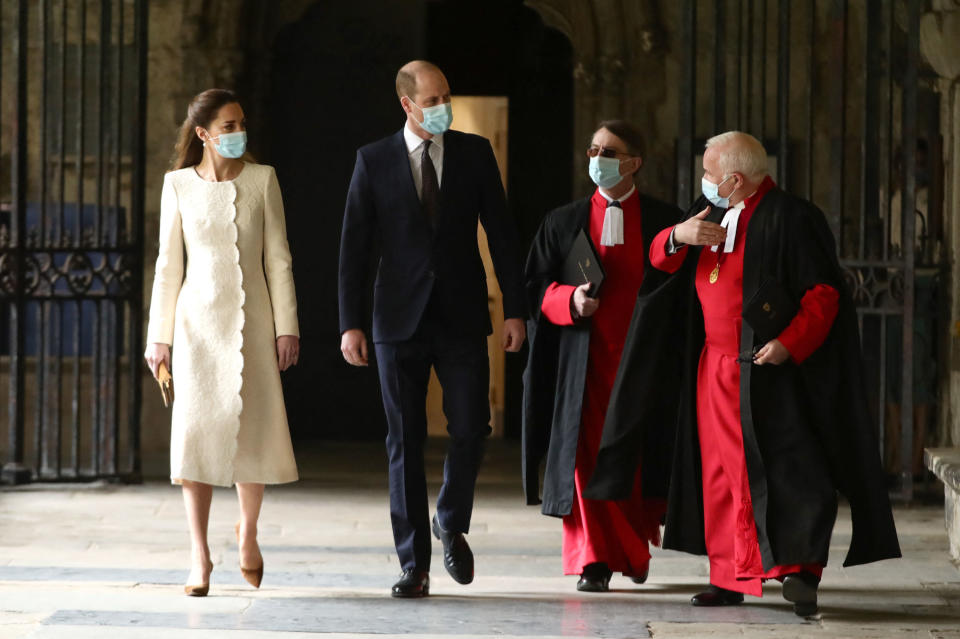 Britain's Prince William, Duke of Cambridge and Britain's Catherine, Duchess of Cambridge, accompanied by the Dean of Westminster The Very Reverend David Hoyle (R) and the Receiver General and Chapter Clerk, Paul Baumann, (2R), arrive for a visit to the coronavirus vaccination centre at Westminster Abbey, central London on March 23, 2021, to pay tribute to the efforts of those involved in the Covid-19 vaccine rollout. (Photo by Aaron Chown / POOL / AFP) (Photo by AARON CHOWN/POOL/AFP via Getty Images)