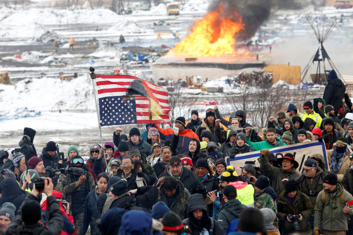 <p>FEB. 22, 2017 – Opponents of the Dakota Access oil pipeline march out of their main camp near Cannon Ball, North Dakota. (Photo: Terray Sylvester/Reuters) </p>