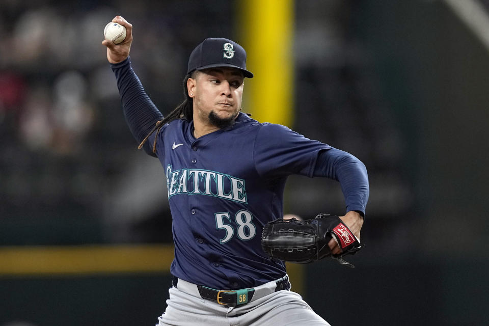 Seattle Mariners starting pitcher Luis Castillo throws to the Texas Rangers in the second inning of a baseball game in Arlington, Texas, Thursday, April 25, 2024. (AP Photo/Tony Gutierrez)