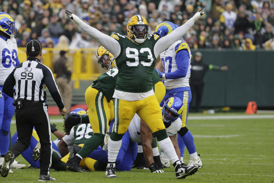 Green Bay Packers defensive tackle T.J. Slaton (93) celebrates after a missed field goal attempt by the Los Angeles Rams during the second half of an NFL football game Sunday, Nov. 5, 2023, in Green Bay, Wis. (AP Photo/Mike Roemer)