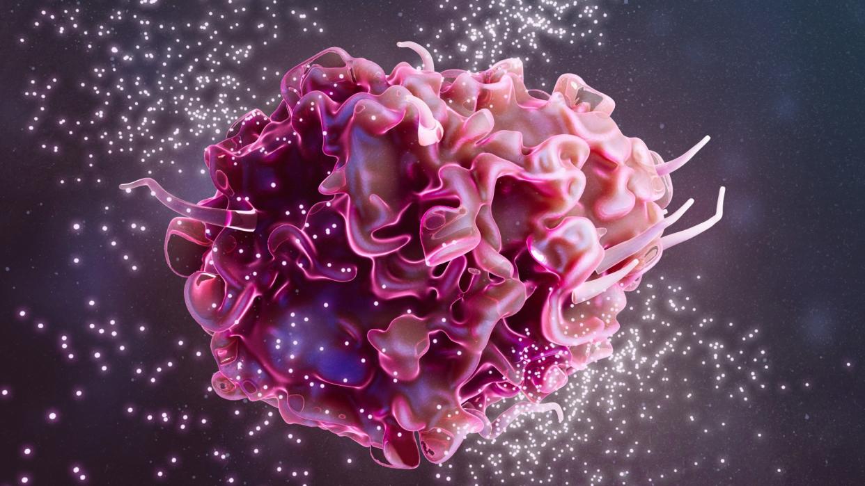  Illustration of a macrophage (in pink) releasing cytokines (in white) against a dark purple background. 