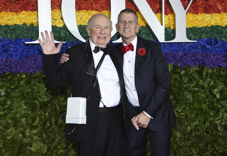 FILE - This June 9, 2019 file photo shows playwright Terrence McNally, left, and Tom Kirdahy at the 73rd annual Tony Awards in New York. McNally, one of America’s great playwrights whose prolific career included winning Tony Awards for the plays "Love! Valour! Compassion!" and "Master Class" and the musicals "Ragtime" and "Kiss of the Spider Woman," died Tuesday, March 24, 2020, of complications from the coronavirus. He was 81. (Photo by Evan Agostini/Invision/AP, File)