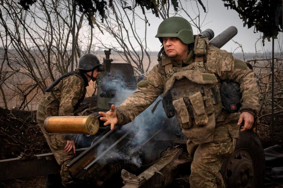 PHOTO: Ukrainian soldiers with the 71st Jaeger Brigade fire a M101 howitzer at Russian positions on the front line, near the city of Avdiivka in Ukraine's Donetsk region, March 22, 2024.  (Efrem Lukatsky/AP, FILE)