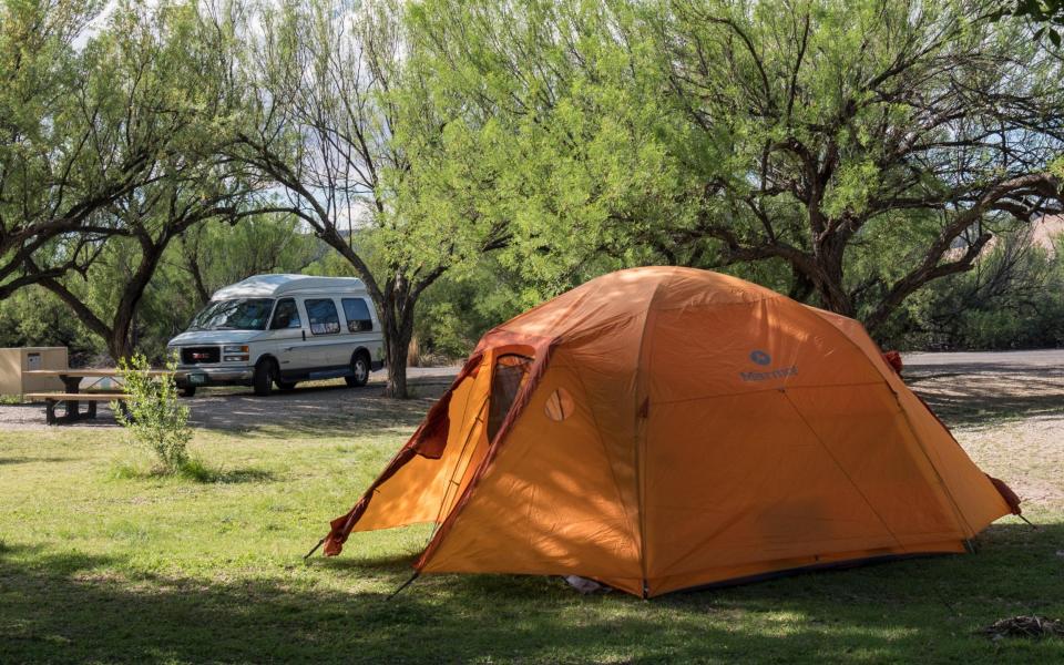 The campsite at the Rio Grande offers flush toilets, picnic tables, grills and fire pits