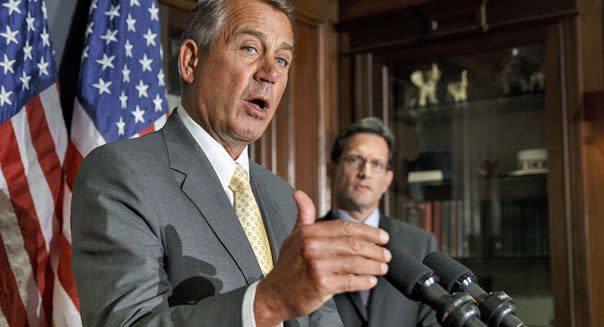 <b class="credit">AP</b>House Speaker John Boehner with House Majority Leader Eric Cantor, at right, at Republican National Committee headquarters in Washington on Tuesday.