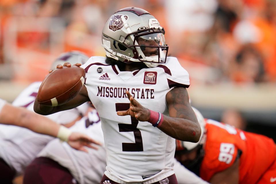 Missouri State quarterback Jason Shelley throws in the first half of an NCAA college football game against Oklahoma State, Saturday, Sept. 4, 2021, in Stillwater, Okla. (AP Photo/Sue Ogrocki)