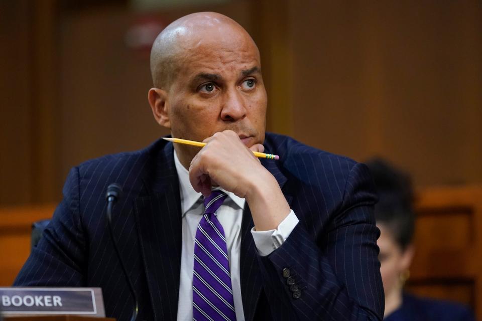 Sen. Cory Booker, D-N.J., listens as Supreme Court nominee Ketanji Brown Jackson testifies during her Senate Judiciary Committee confirmation hearing on Capitol Hill in Washington, Tuesday, March 22, 2022.