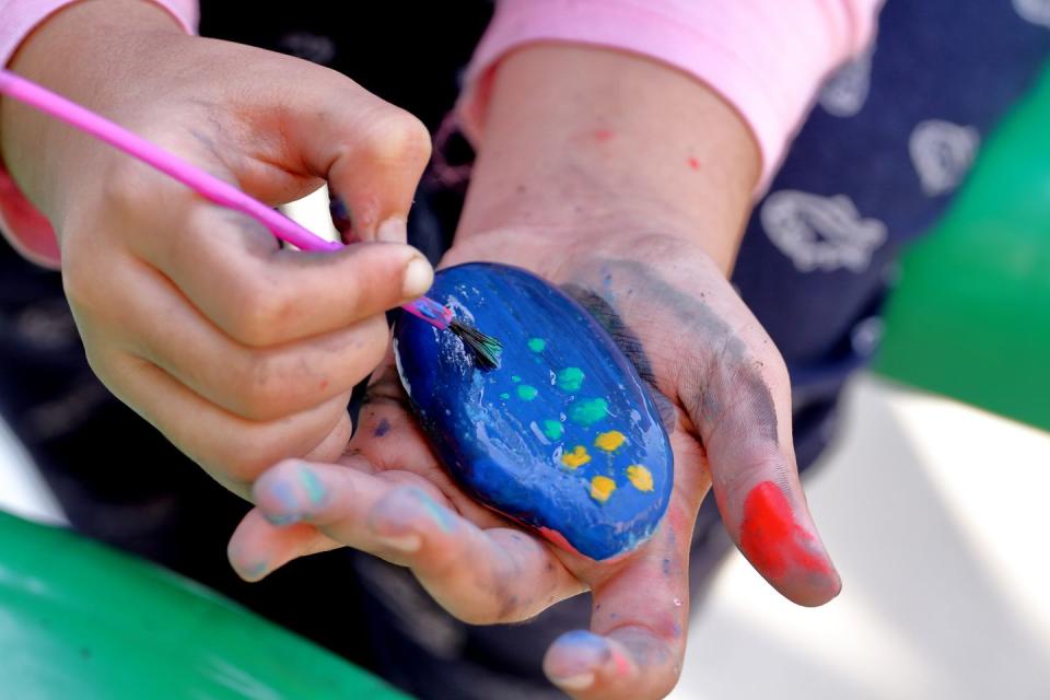 Collect and paint rocks.