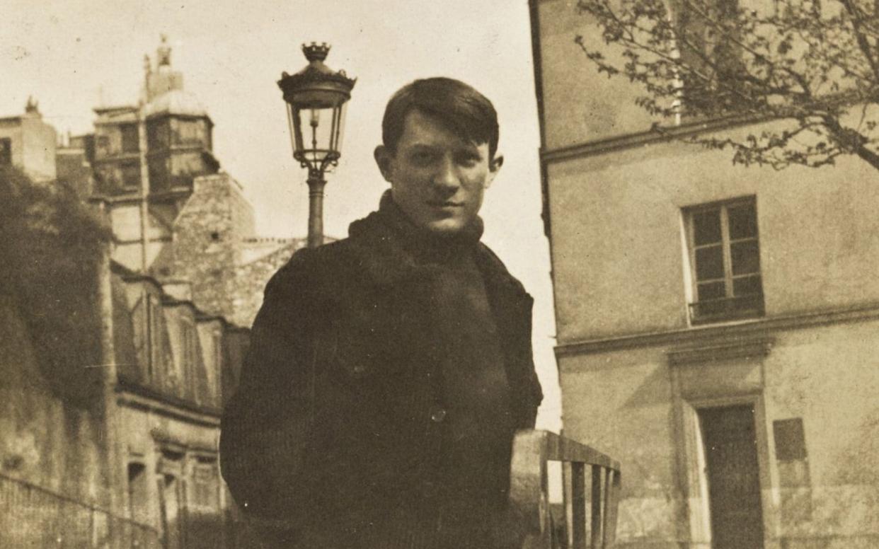 'Like a fishbone forever stuck in his throat': his brush with the law troubled Picasso throughout his life (pictured here in Montmartre in 1904) - Heritage Images/Getty