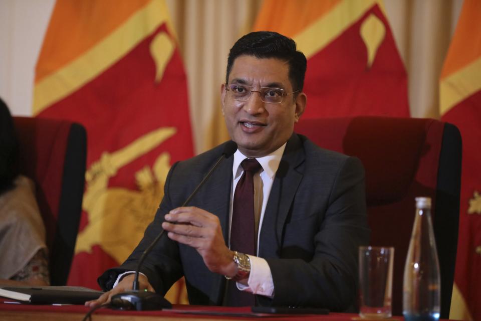 Foreign minister of Sri Lanka Ali Sabry gestures as he addresses media in Colombo, Sri Lanka, Monday, Sept. 5, 2022. (AP Photo/STR)