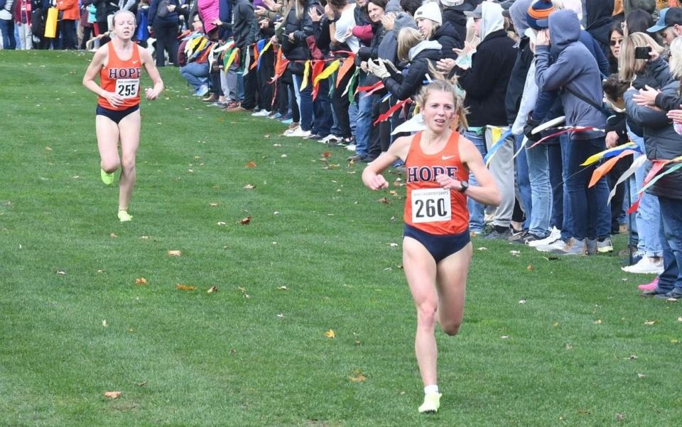 Hope runner Maddie Struck crosses the finish line at the NCAA Division III regional meet.