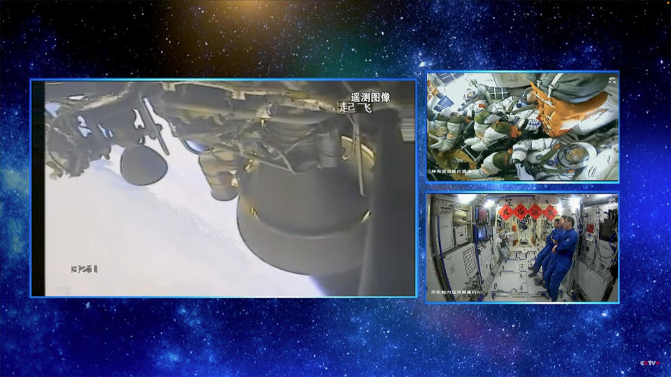 A multi-camera view showing the Long March 2F's second stage engines, the Shenzhou 17 crew monitoring cockpit displays (upper right) and the Shenzhou 16 crew (lower right) watching live launch coverage aboard the Tiangong space station. / Credit: CCTV