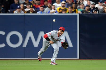 FILE PHOTO: Apr 18, 2019; San Diego, CA, USA; Cincinnati Reds left fielder Matt Kemp (27) makes a play on a ball hit by San Diego Padres right fielder Franmil Reyes (not pictured) to end the fourth inning at Petco Park. Mandatory Credit: Jake Roth-USA TODAY Sports