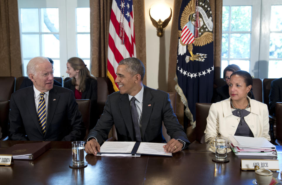 FILE - In this April 5, 2016, file photo President Barack Obama looks to Vice President Joe Biden, left, as National Security Adviser Susan Rice, sits right, before he speaks to media during a meeting with Combatant Commanders and Joint Chiefs of Staff in the Cabinet Room of the White House in Washington. Democratic presidential nominee Joe Biden is in the final stages of selecting his running mate. Among the contenders is Susan Rice, who worked closely with Biden in the Obama administration and regularly briefed him on pressing foreign policy matters when she served as national security adviser. (AP Photo/Carolyn Kaster, File)