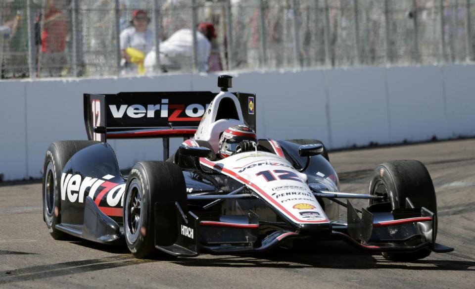 Will Power, of Australia, drives into Turn 10 during the IndyCar Grand Prix of St. Petersburg auto race, Sunday, March 30, 2014, in St. Petersburg, Fla. Power won the race. (AP Photo/Chris O'Meara)