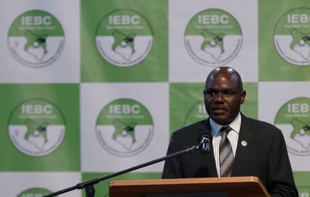 Kenyan Independent Electoral and Boundaries Commission (IEBC) chairman Wafula Chebukati announces the winner of polls in Kenya's election at the Bomas of Kenya, in Nairobi, Kenya August 11, 2017. REUTERS/Thomas Mukoya