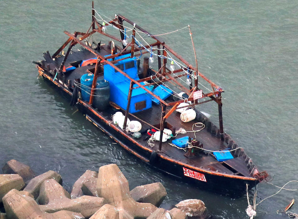 Eight men who said they are fishermen from North Korea were found with this boat on Friday along northern Japan's coast. (Photo: KYODO Kyodo / Reuters)