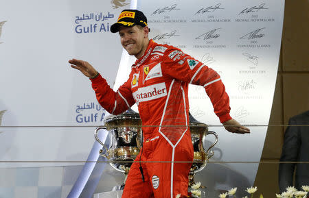 Formula One - F1 - Bahrain Grand Prix - Sakhir, Bahrain - 16/04/17 - Ferrari Formula One driver Sebastian Vettel of Germany celebrates after winning Bahrain Grand Prix. REUTERS/Hamad I Mohammed