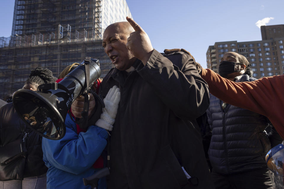 New York City Police Department clergy liaison Chaplain Robert Rice speaks during a news conference organized by the National Action Network near the scene of shooting in Harlem the day before, Saturday, Jan. 22, 2022, in New York. (AP Photo/Yuki Iwamura)