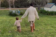 <p>Mom and Archie walk hand-in-hand — maybe to <a href="https://people.com/royals/meghan-markle-prince-harry-oprah-interview-chicken-coop-california-home-archie-chick-inn/" rel="nofollow noopener" target="_blank" data-ylk="slk:his chicken coop?;elm:context_link;itc:0;sec:content-canvas" class="link ">his chicken coop?</a></p>