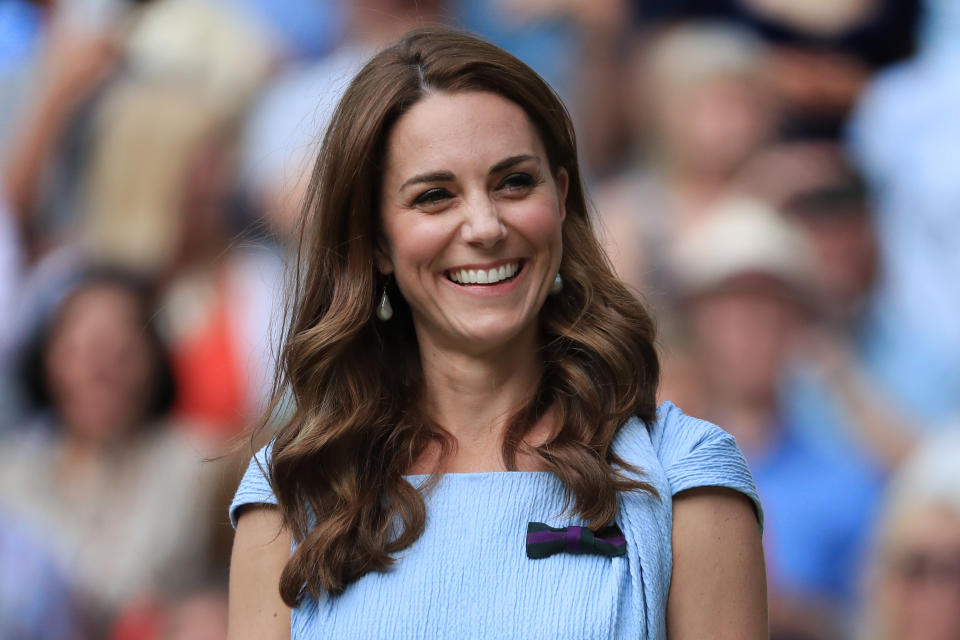 LONDON, ENGLAND - JULY 14: Catherine, Duchess of Cambridge laughs and smiles on Day 13 of The Championships - Wimbledon 2019 at the All England Lawn Tennis and Croquet Club on July 14, 2019 in London, England. (Photo by Simon Stacpoole/Offside/Getty Images)