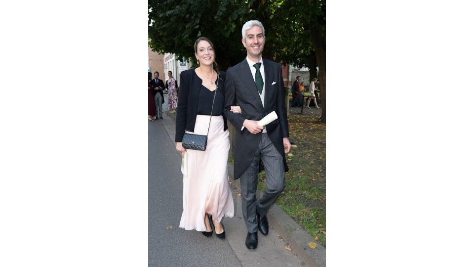 Princess Alexandra and Prince Nicolas walking at a wedding ceremony