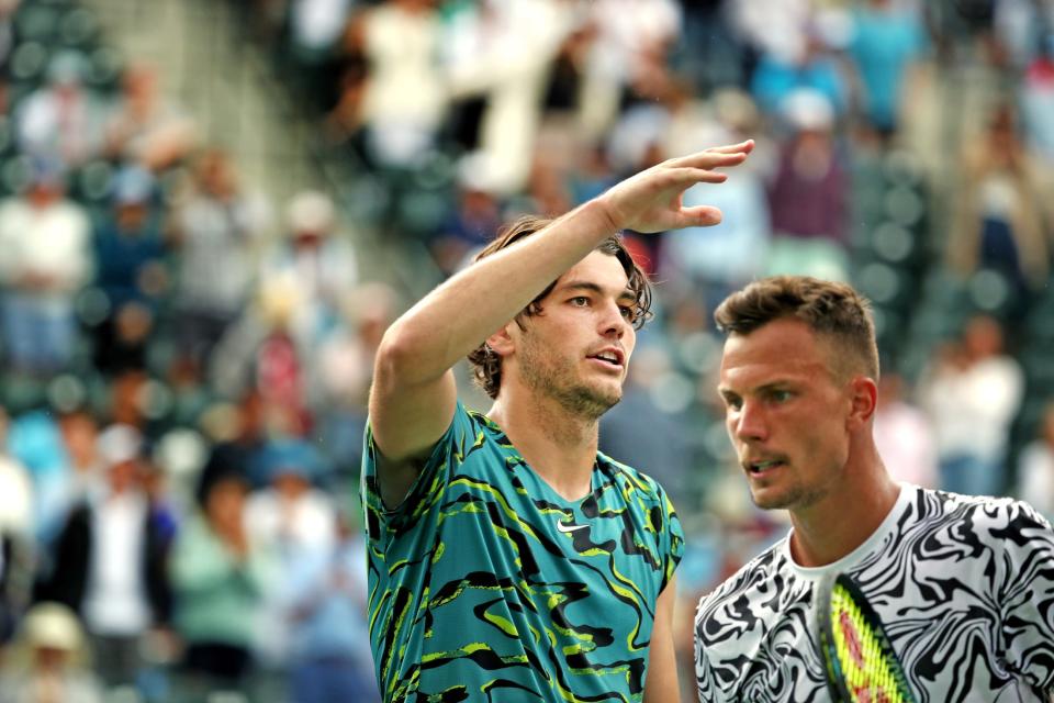 Taylor Frtiz, right, defeated Marton Fucsovics their fourth-round match at BNP Paribas Open in Indian Wells, Calif., on Tuesday, March 14, 2023.