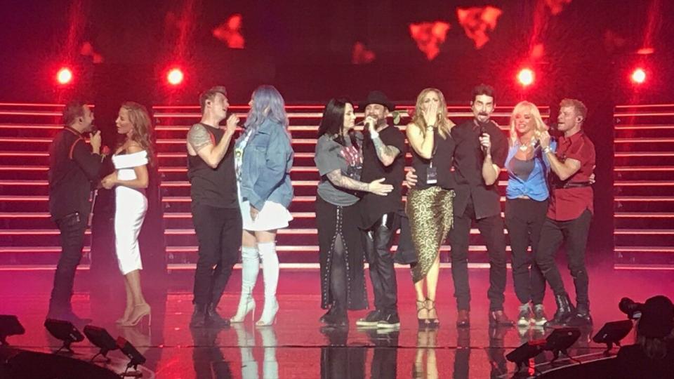 The singers sweetly escorted their gorgeous wives on stage during their final 'Larger Than Life' residency gig in Las Vegas.